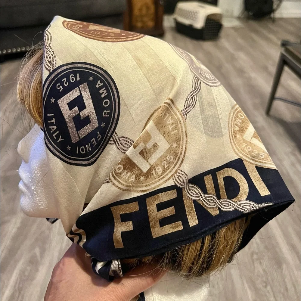 Fendi scarf 23 x 22.5” spend $400 get a free designer scarf valves at $400.